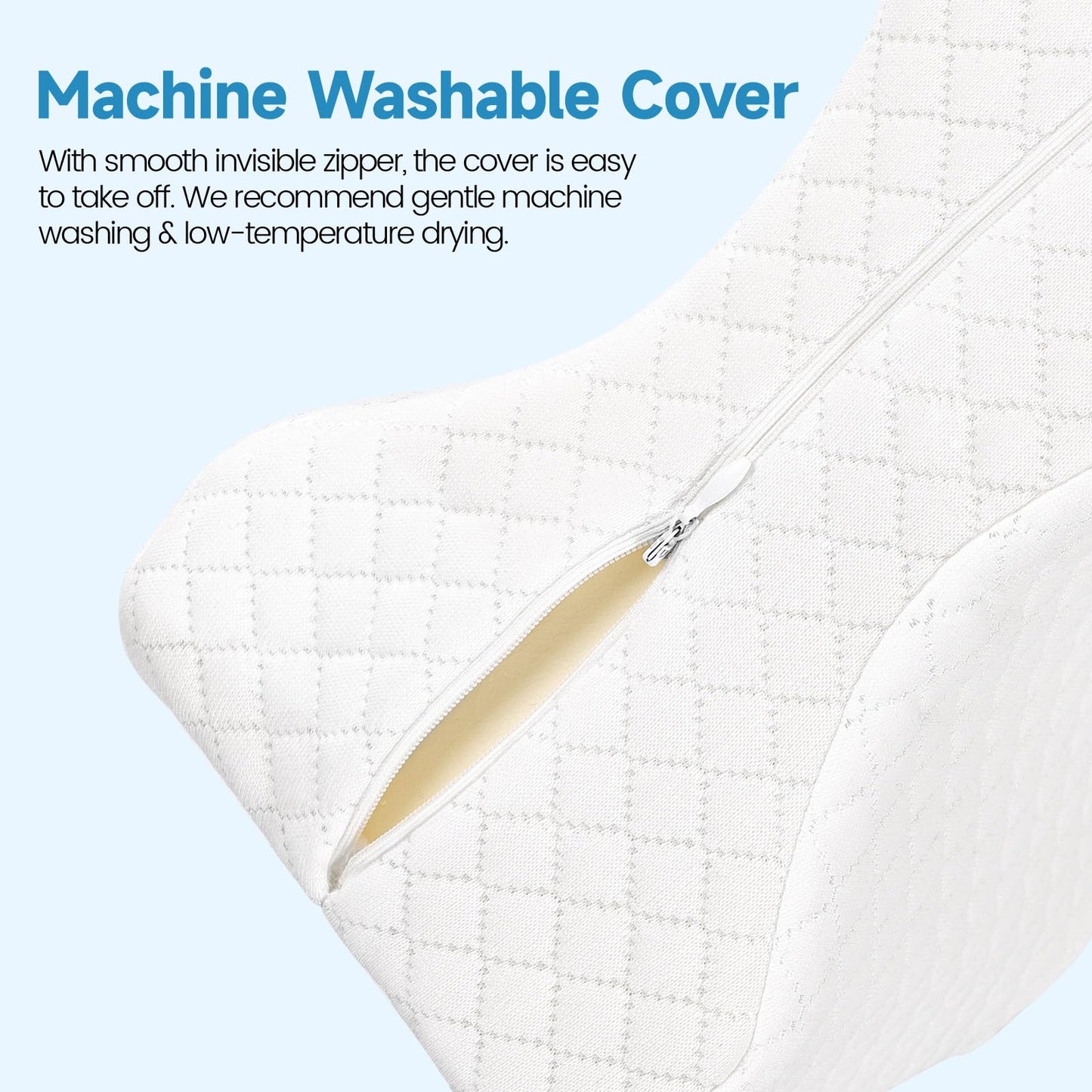 White quilted knee pillow close-up with visible zipper on the cover