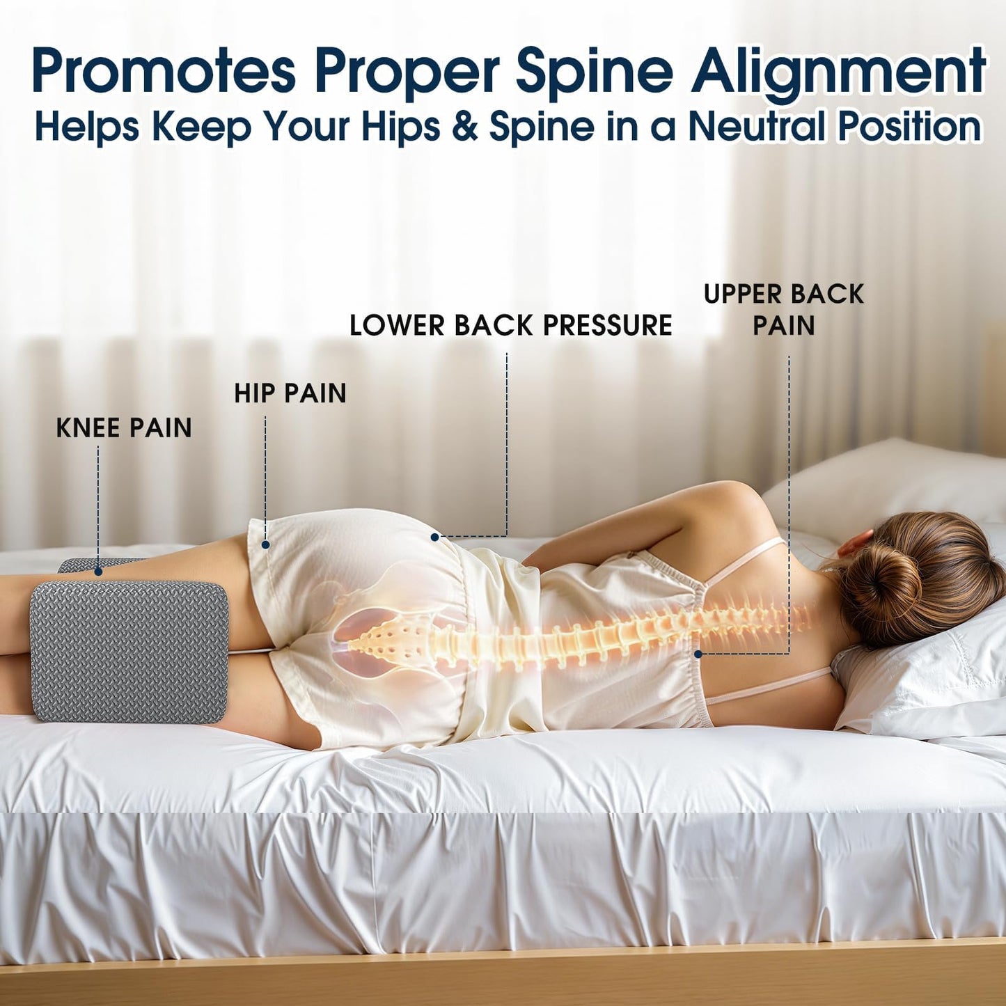 Gray contoured knee pillow supporting the hips and lower back area