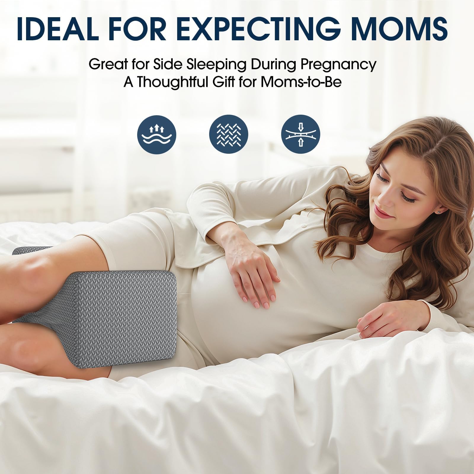 Gray contoured knee and leg pillow supporting side sleeping posture