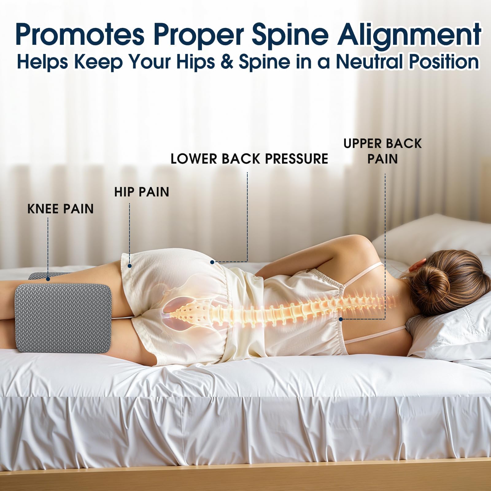 Gray contoured knee pillow supporting the hips and lower back area