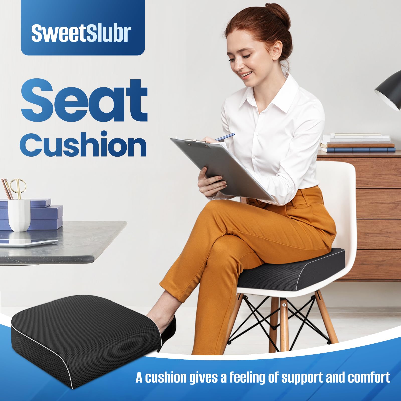 Black seat cushion with subtle texture, rounded corners, and stitched trim